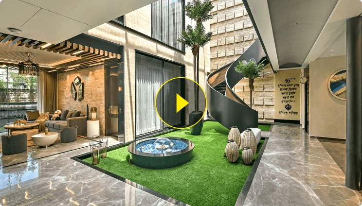 Buildofy video series showing a luxury living room and indoor courtyard with a spiral staircase.