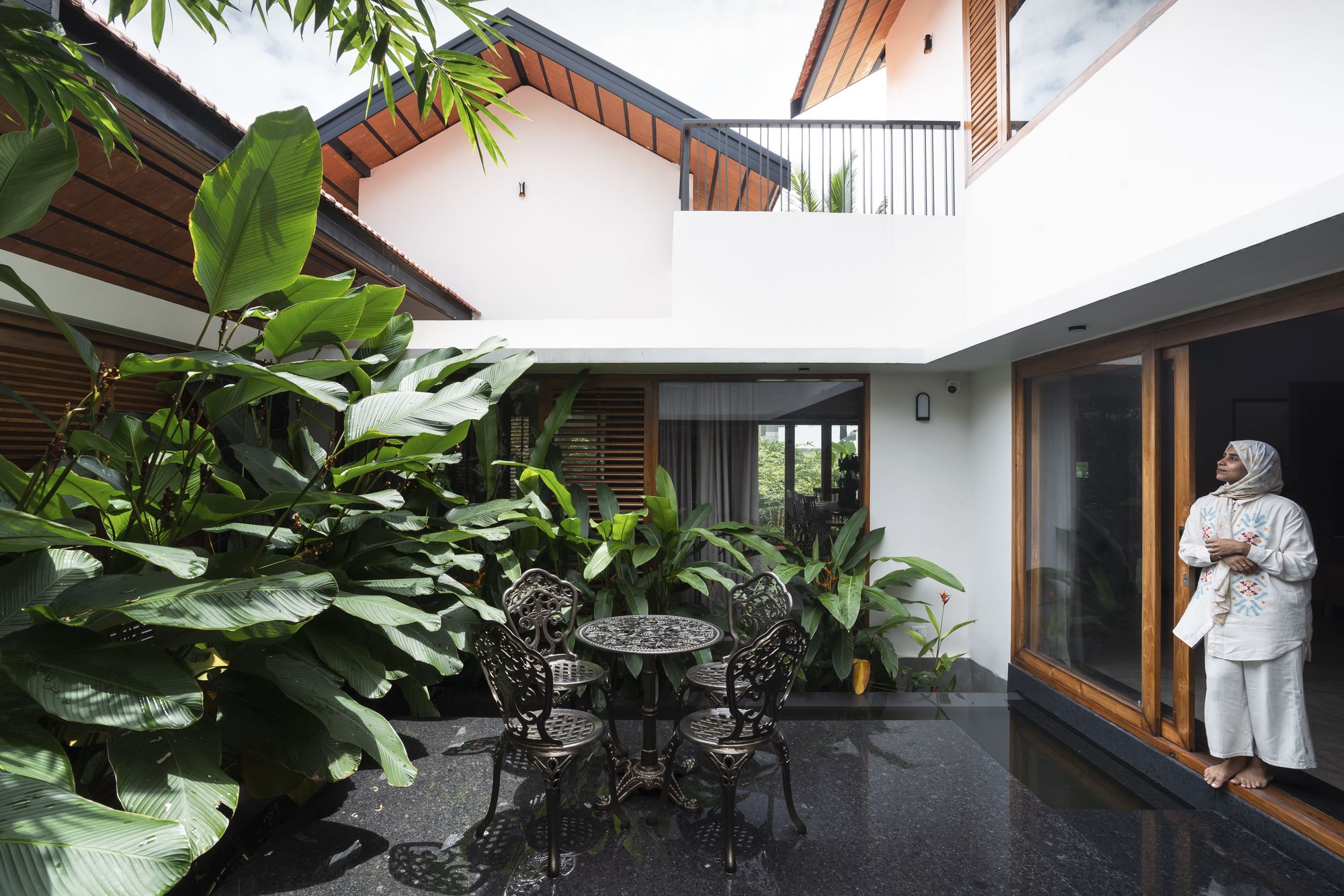 This Tropical Home in Wandoor has a Water Courtyard as the Main Anchor