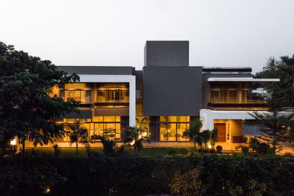 Nestled amidst dense greenery, this villa mindfully tackles the extreme climate of Ahmedabad