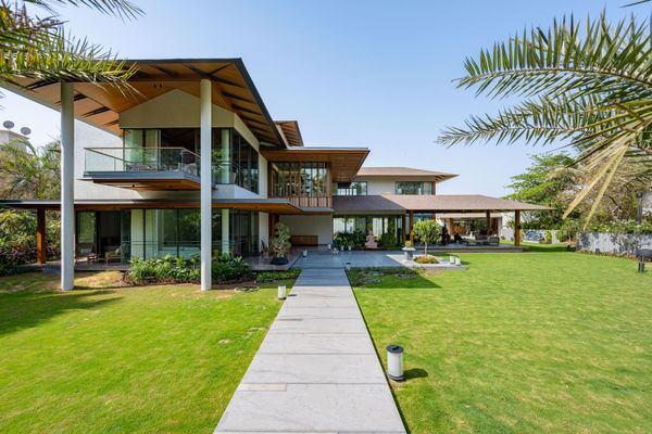 The House With Sloping Roofs In Ahmedabad Strikes A Harmony Between The Green And The Built